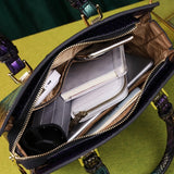 Paneled Serpentine Leather Handbag